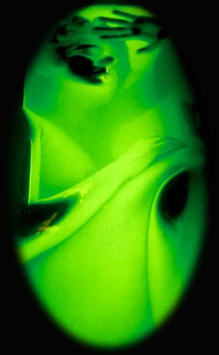 figure in aquarium with fluorescent water